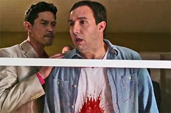 Photo of John Manzelli playing Burn Notice TV character Erick Kemp