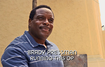 Photo of Chad Coleman playing Burn Notice TV character Agent Brady Pressman